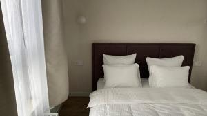 Posteľ alebo postele v izbe v ubytovaní 2-room in new house, Wola