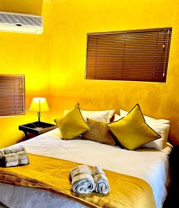 Ein Bett oder Betten in einem Zimmer der Unterkunft Manzini Chalets