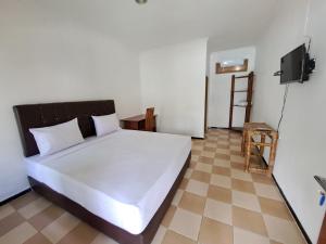 クタにあるSurfers Beachfront Lombokのギャラリーの写真 +31枚の写真