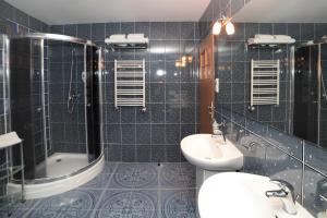 Koupelna v ubytování Hotel IKAR