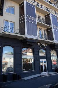 a building with a zenith hotel on the street at Zenith Hotel in Odesa