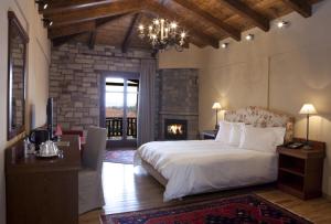 Posteľ alebo postele v izbe v ubytovaní Kazarma Hotel