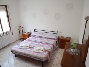 A bed or beds in a room at Relax&Natura a 6 minuti da BRESCIA Wifi a Rezzato