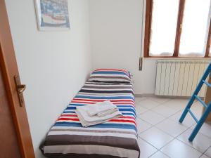 A bed or beds in a room at Relax&Natura a 6 minuti da BRESCIA Wifi a Rezzato