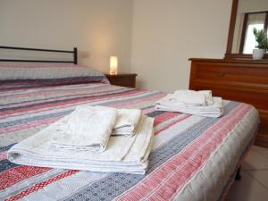 A bed or beds in a room at Relax&Natura a 6 minuti da BRESCIA Wifi a Rezzato