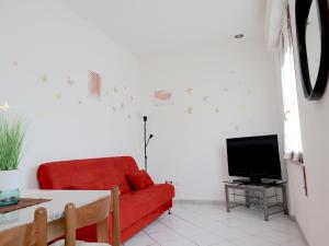 A television and/or entertainment centre at Relax&Natura a 6 minuti da BRESCIA Wifi a Rezzato