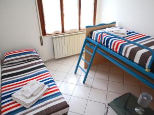 A bed or beds in a room at Relax&Natura a 6 minuti da BRESCIA Wifi a Rezzato