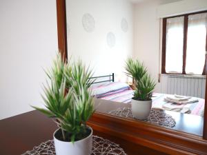 A bed or beds in a room at Relax&Natura a 6 minuti da BRESCIA Wifi a Rezzato