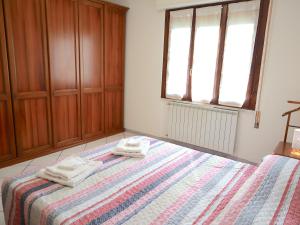 A bed or beds in a room at Relax&Natura a 6 minuti da BRESCIA Wifi a Rezzato