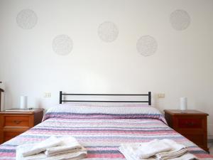 A bed or beds in a room at Relax&Natura a 6 minuti da BRESCIA Wifi a Rezzato