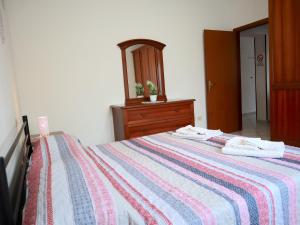 A bed or beds in a room at Relax&Natura a 6 minuti da BRESCIA Wifi a Rezzato