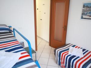 A bed or beds in a room at Relax&Natura a 6 minuti da BRESCIA Wifi a Rezzato