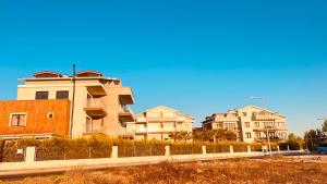 a row of houses on the side of a road at Exclusives Apartment Mountainview Residence in Belek