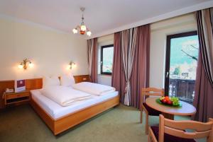 Krevet ili kreveti u jedinici u okviru objekta Hotel zum Lamm