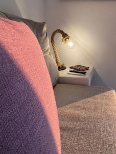A bed or beds in a room at Aerino Seaside