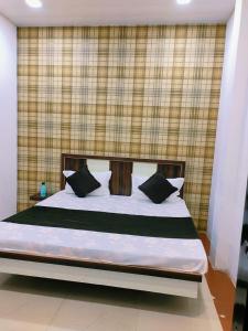 Ένα ή περισσότερα κρεβάτια σε δωμάτιο στο Green View Guest House