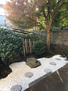 Сад в 澄心小筑 房东住一楼 客人住二楼 每天只接一组客人 雄琴车站免费接送 提供一台免费停车位