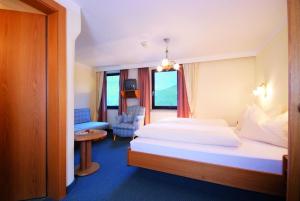 Krevet ili kreveti u jedinici u okviru objekta Hotel zum Lamm