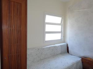 Cama o camas de una habitación en Apartamento Pitangueiras
