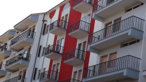 a building with balconies on the side of it at Apartment Angioletta in Manfredonia