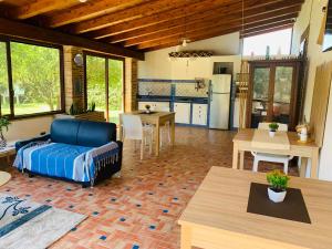a living room with a couch and a table at Casa Nunna in Palma di Montechiaro