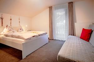 Postel nebo postele na pokoji v ubytování Apartments Renata Gries 201