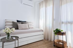 A bed or beds in a room at Avanti Luz de Sevilla, hazte un regalo y disfrutalo
