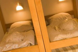 Ein Bett oder Betten in einem Zimmer der Unterkunft Youth Hostel Vianden