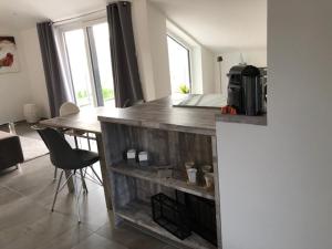 a kitchen with a wooden counter top in a room at Ferienwohnung Ederseeblick in Waldeck
