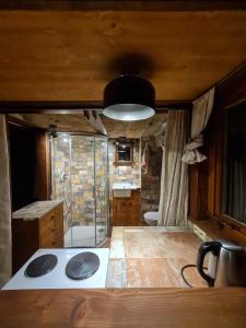Kuchyň nebo kuchyňský kout v ubytování Bivak 14 - Krásný malý apartmán pro milovníky skal a přírody