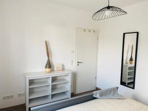 Postel nebo postele na pokoji v ubytování Gemütliche Neubauwohnung 70qm