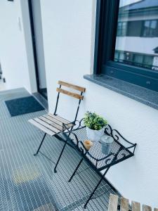 Balkón nebo terasa v ubytování Gemütliche Neubauwohnung 70qm