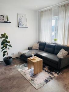 Posezení v ubytování Gemütliche Neubauwohnung 70qm