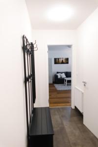Postel nebo postele na pokoji v ubytování Apartmán s nádherným výhledem v centru Harrachova