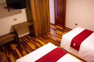 Postel nebo postele na pokoji v ubytování Zans Apartments Cusco