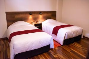 Postel nebo postele na pokoji v ubytování Zans Apartments Cusco
