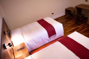 Postel nebo postele na pokoji v ubytování Zans Apartments Cusco