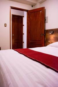 Postel nebo postele na pokoji v ubytování Zans Apartments Cusco