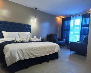 Postel nebo postele na pokoji v ubytování MARINA MARINDQUE HOTEL AND RESORT