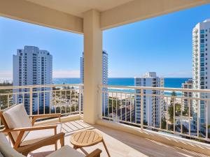 a balcony with a view of the ocean at Maldives Resort Main Beach, Gold Coast in Gold Coast