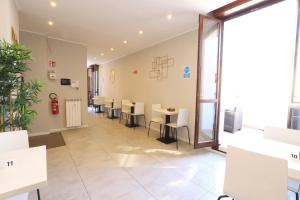 Um restaurante ou outro lugar para comer em Carlo Goldoni Hotel