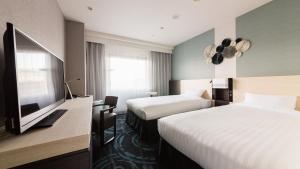 TV a/nebo společenská místnost v ubytování JR-East Hotel Mets Mizonokuchi