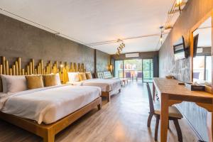 Postel nebo postele na pokoji v ubytování Anyavee Krabi Beach Resort
