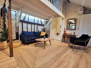 Posedenie v ubytovaní Loft atypique au calme avec cour privative