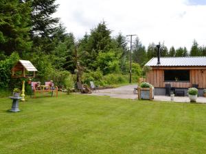 a yard with a gazebo and a house at Dark Sky Lodge in Cray