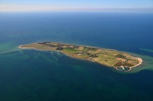 an island in the middle of the water at Private island - Vejrø Resort - Transport included from Kragenæs Harbor in Vejrø