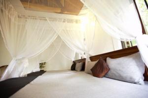 Ένα ή περισσότερα κρεβάτια σε δωμάτιο στο Mahapillawa House