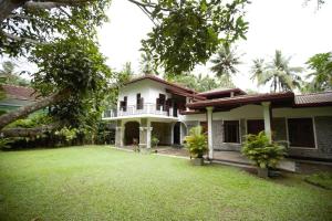 Κήπος έξω από το Mahapillawa House