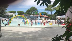 The swimming pool at or close to MareBlue Mobilhomes on Camping Mare e Pineta