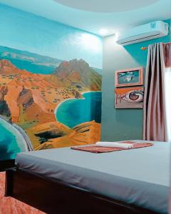 Tempat tidur dalam kamar di Lontart Guesthouse